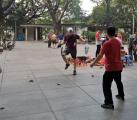 Guangzhou Walking Tours of Sai Kwan - Playing Chinese hacky sack.jpg
